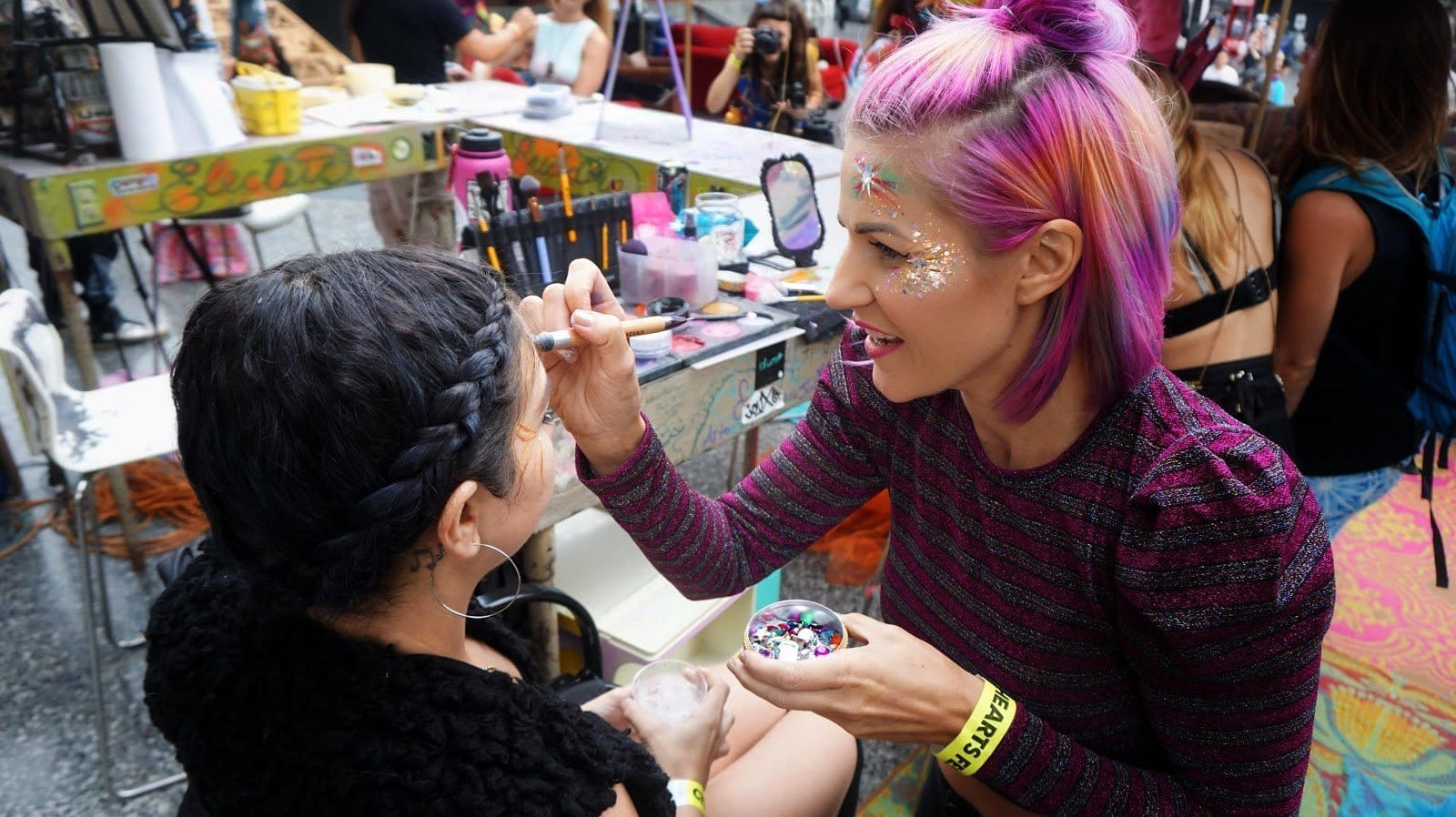 @jamiejanettart creating festival makeup during City Hearts