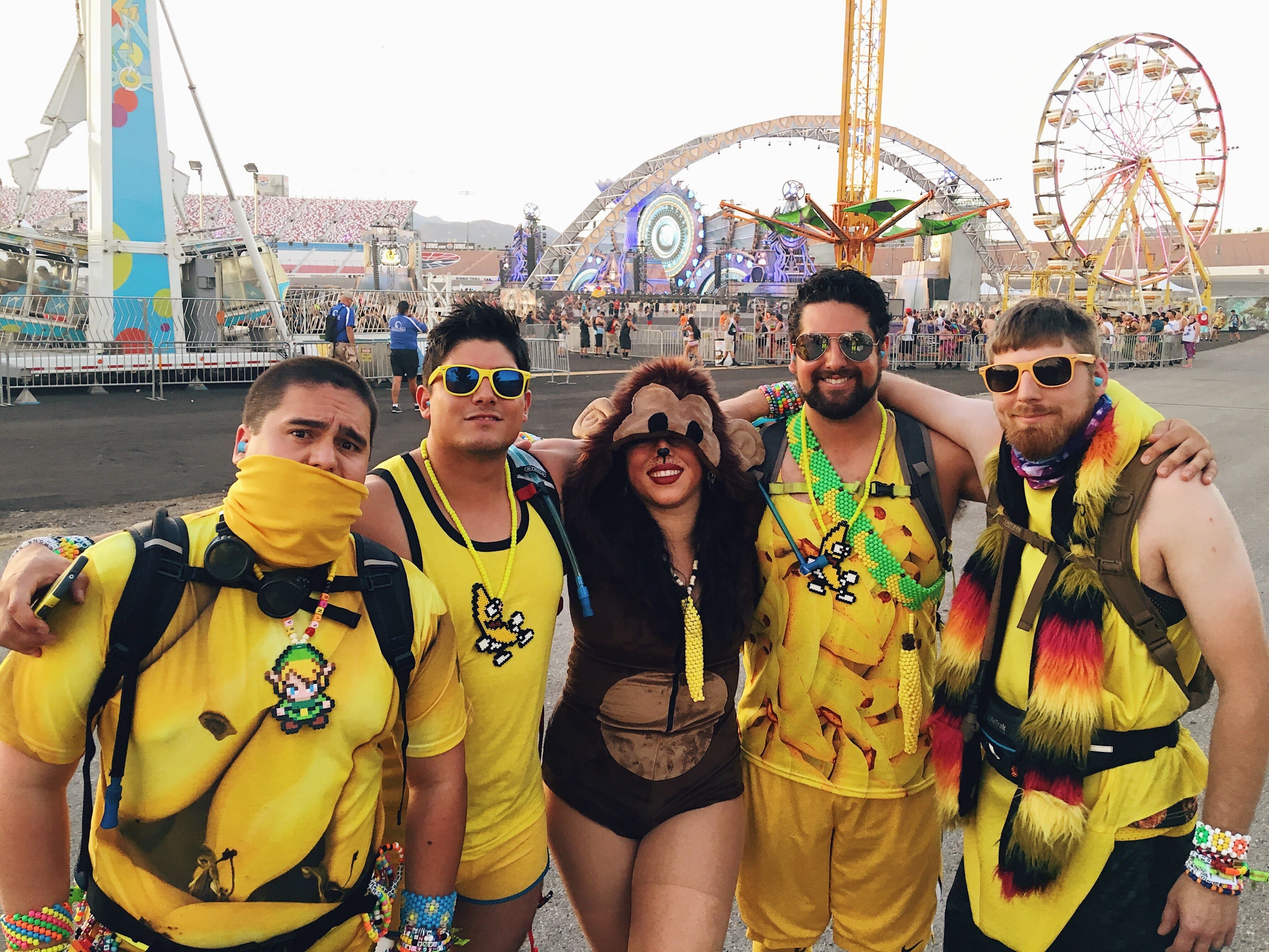 group of ravers wearing banana themed rave outfits